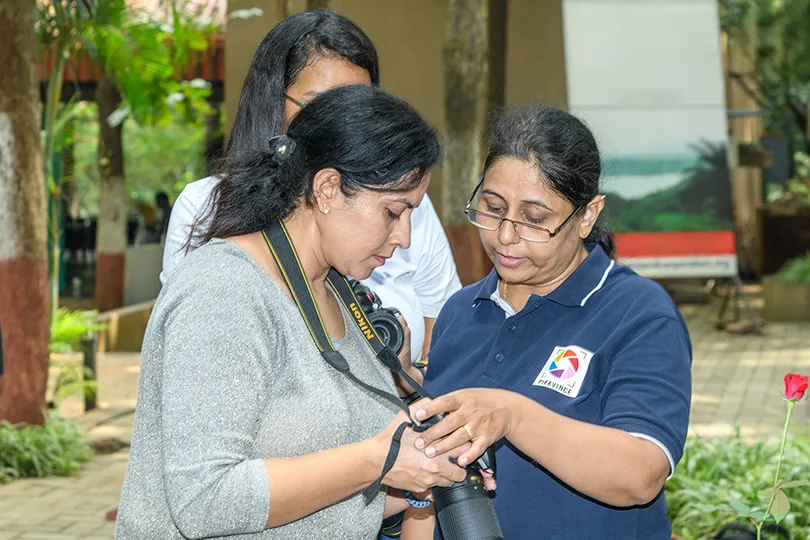 Pixavince mentor guiding photography course participants